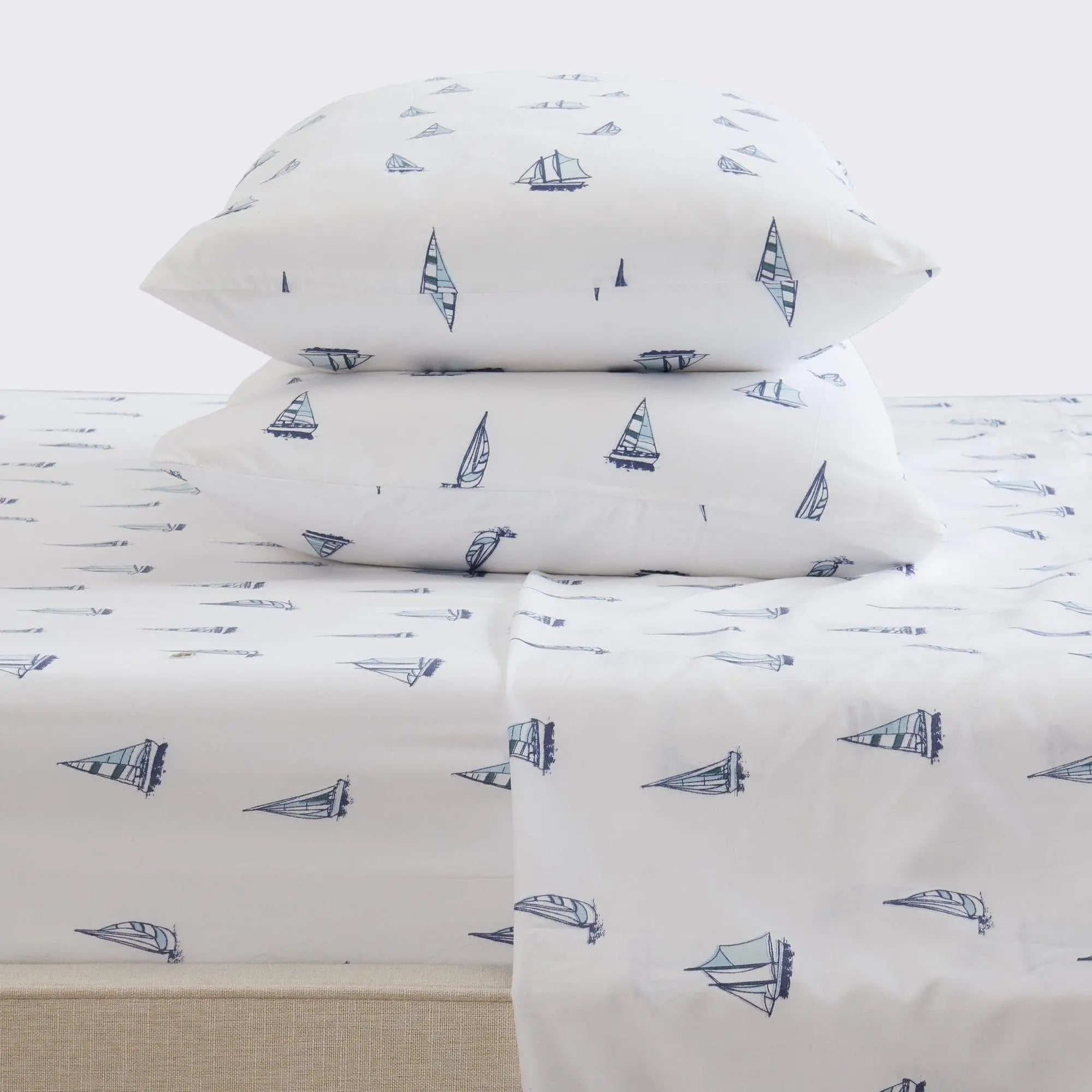 Coastal Sheet Set - Nantucket Collection by Great Bay Home, white with navy sailboat print; shown with 2 pillows