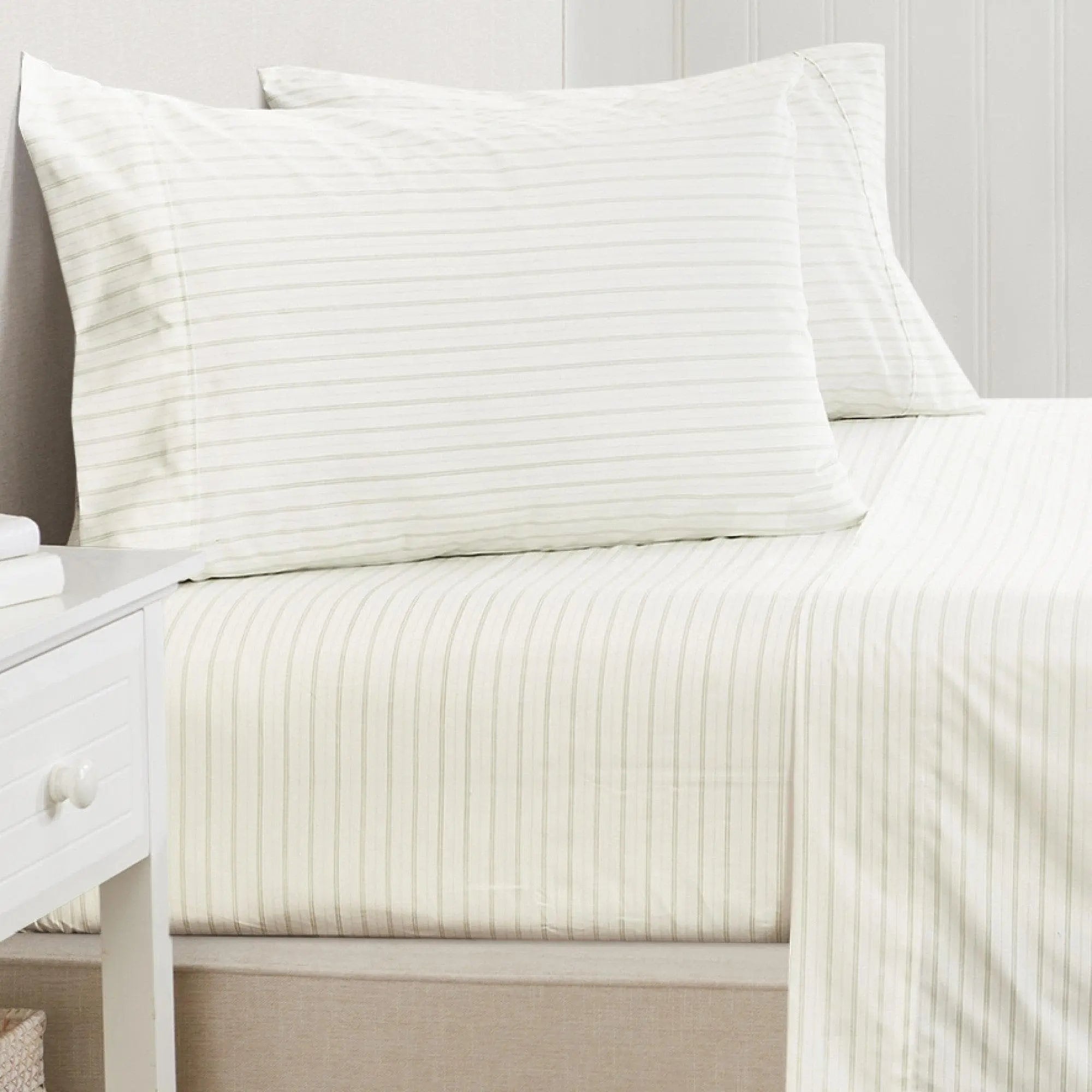 Stripe Sheet Set - Adeline Collection on bed with two cream striped pillowcases and matching striped sheets