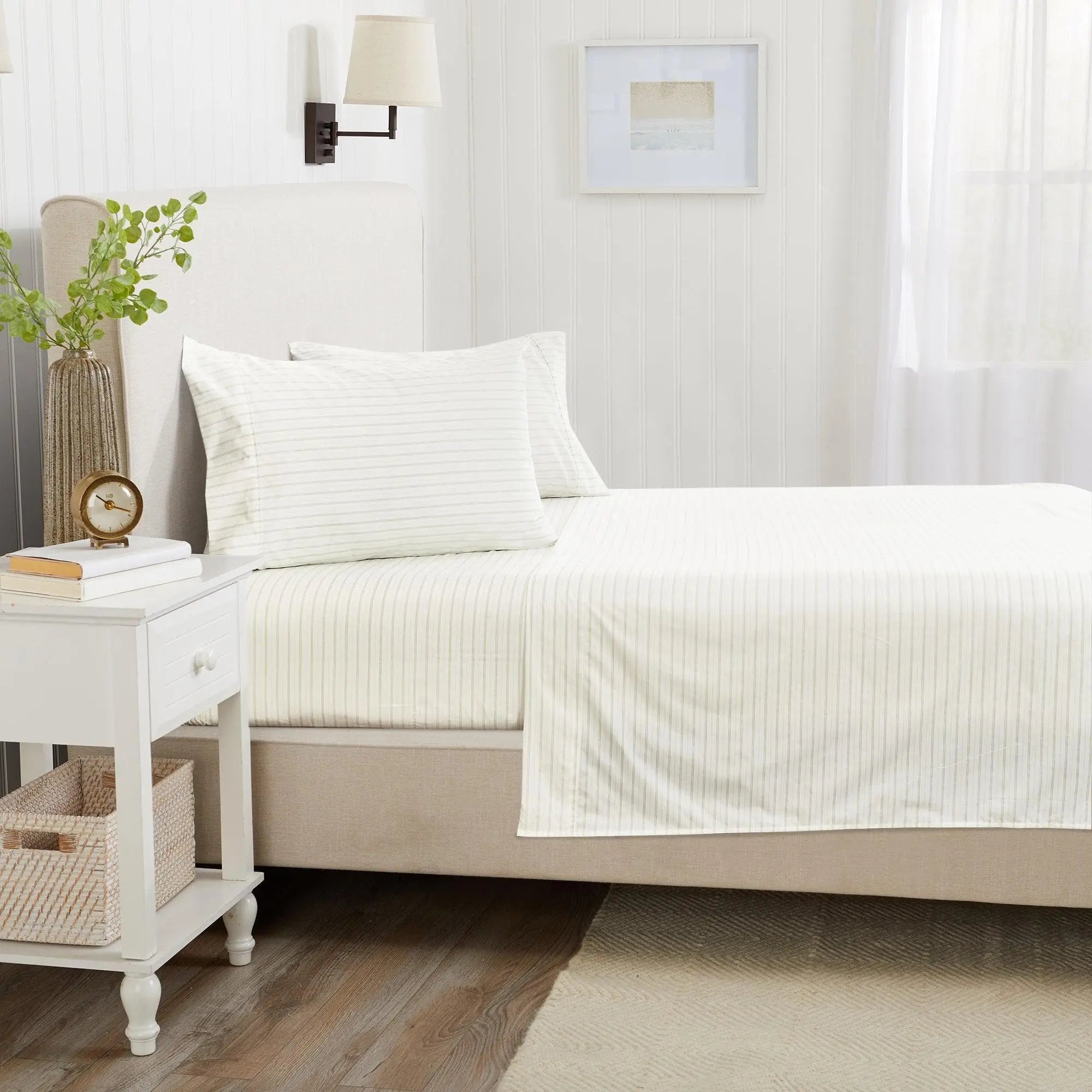 Stripe Sheet Set Adeline Collection by Great Bay Home on a white bed with pale cream-and-white stripes.