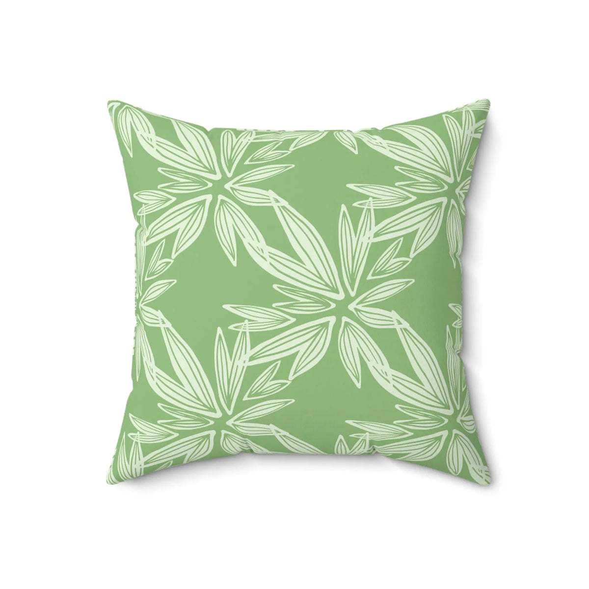 Green botanical accent pillow with a tropical leaf design