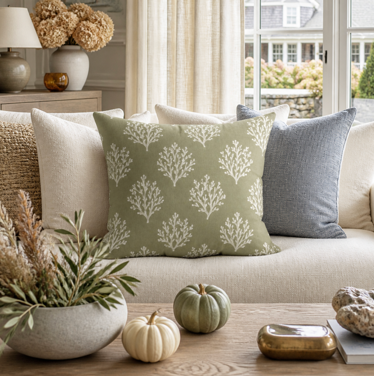 Green and white coral decorative cushion for coastal living room styling