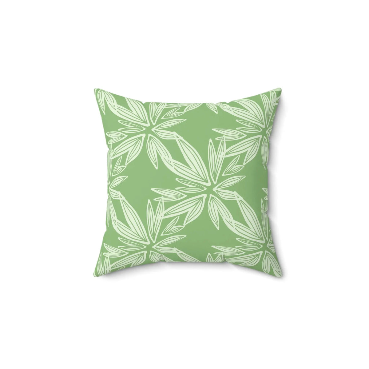 Green and white tropical leaf pillow for neutral coastal decor