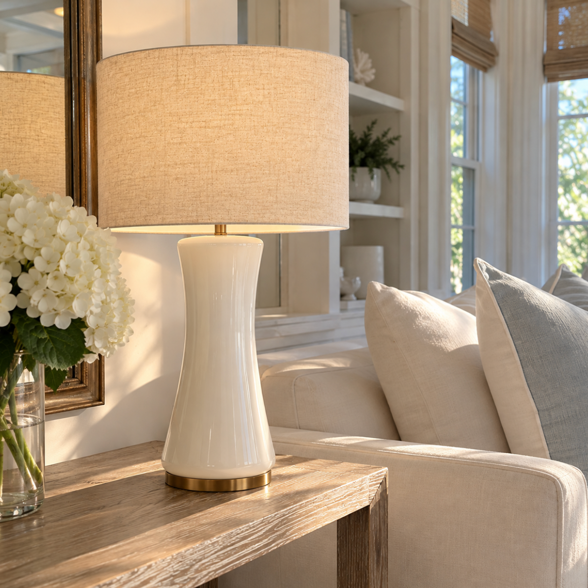 White table lamp with gold accents inspired by Hamptons coastal interiors.