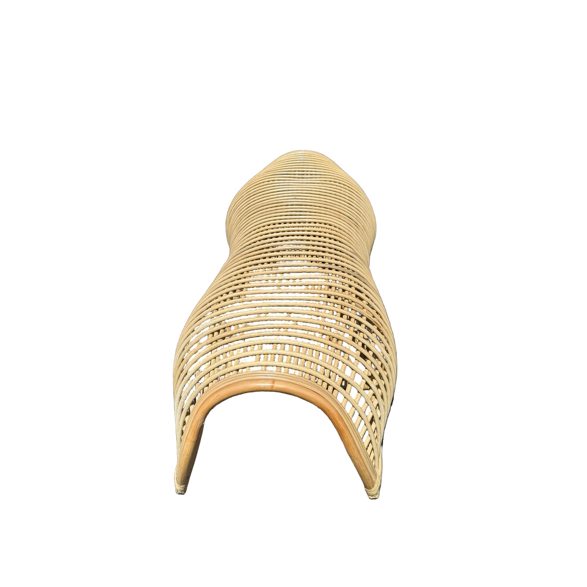 Close-up of the natural woven lattice and curved wood-toned frame of a sculptural rattan bench.
