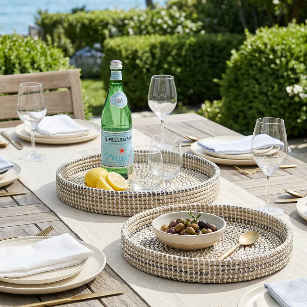 Handwoven seagrass coastal tray with natural texture and blue undertones, eco-friendly serving tray