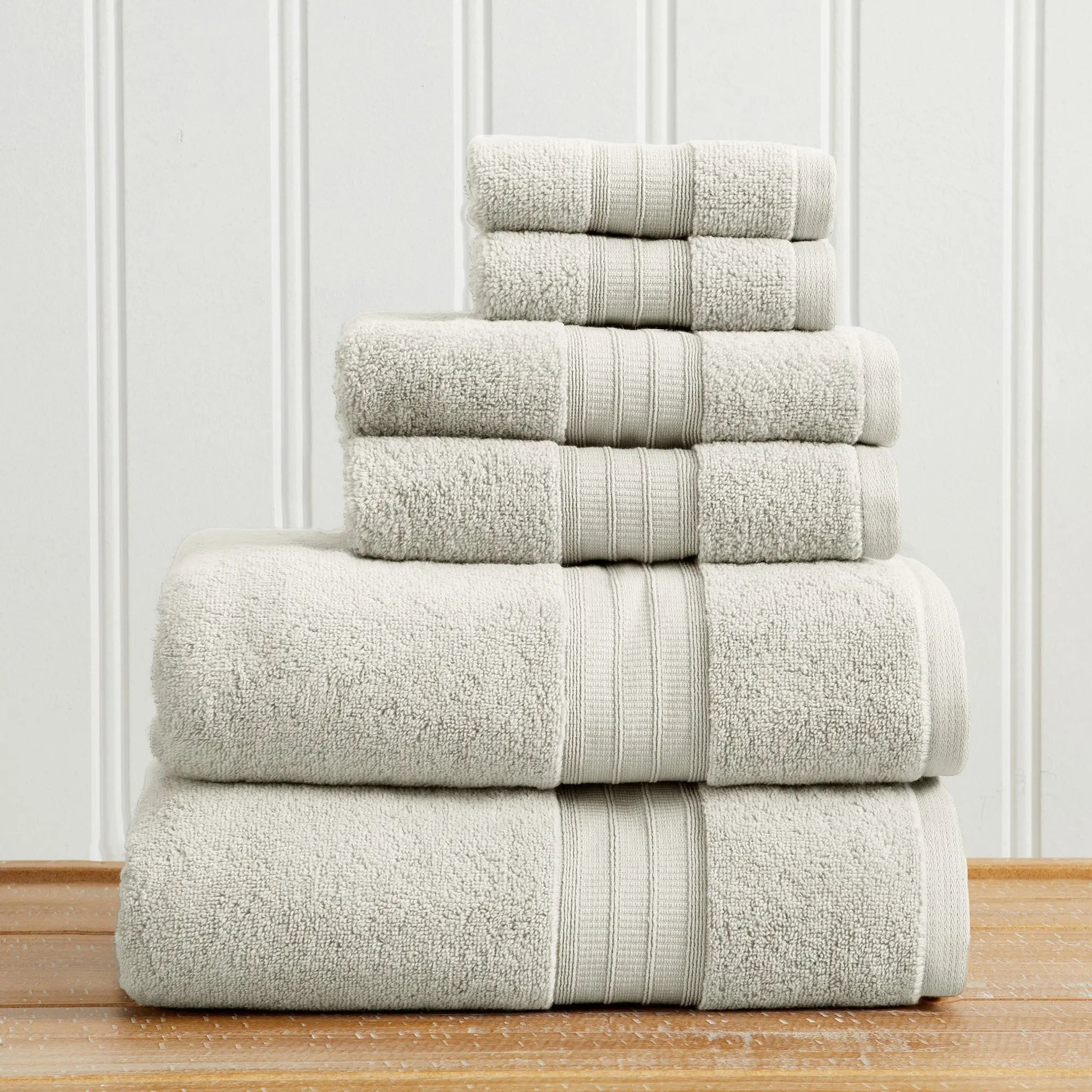 Great Bay Home 6-piece 100% cotton bath towel set, Chiara Collection in cream, stacked towels.