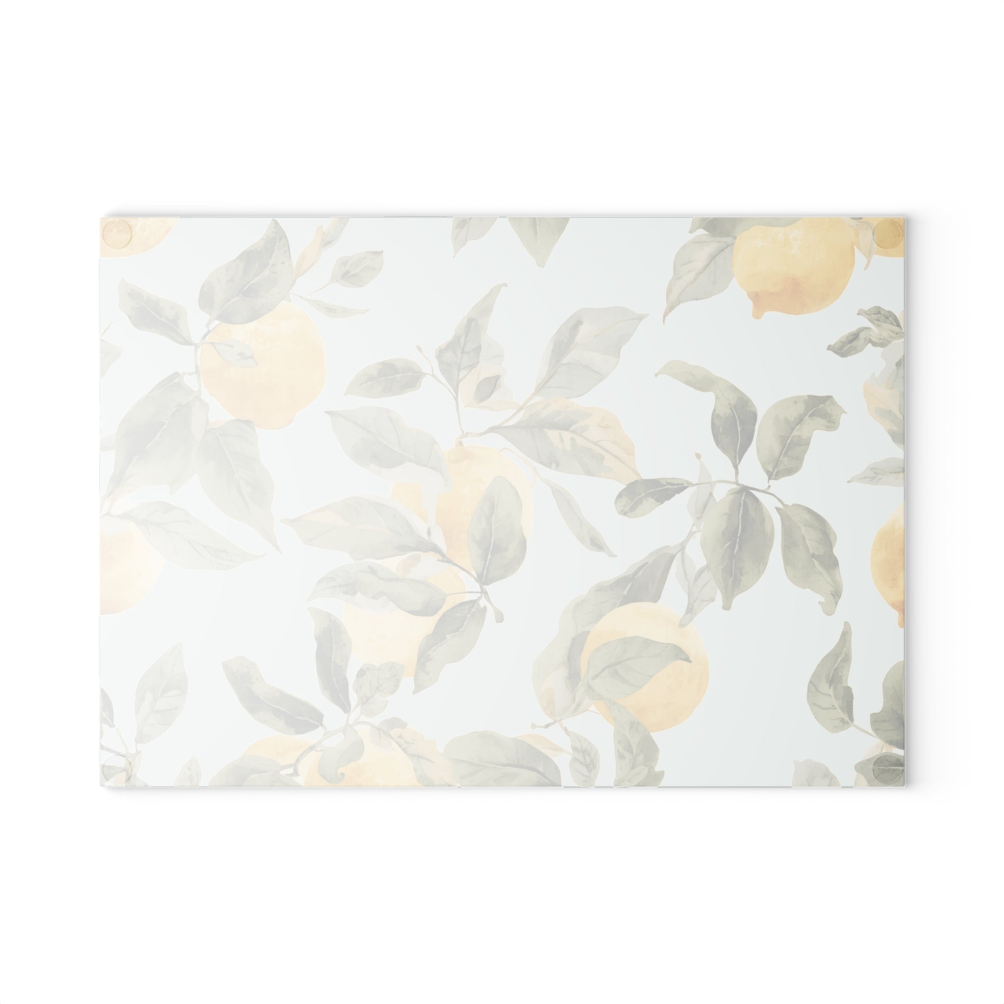 Glass serving board with yellow lemons used as a citrus themed cheese board for entertaining.