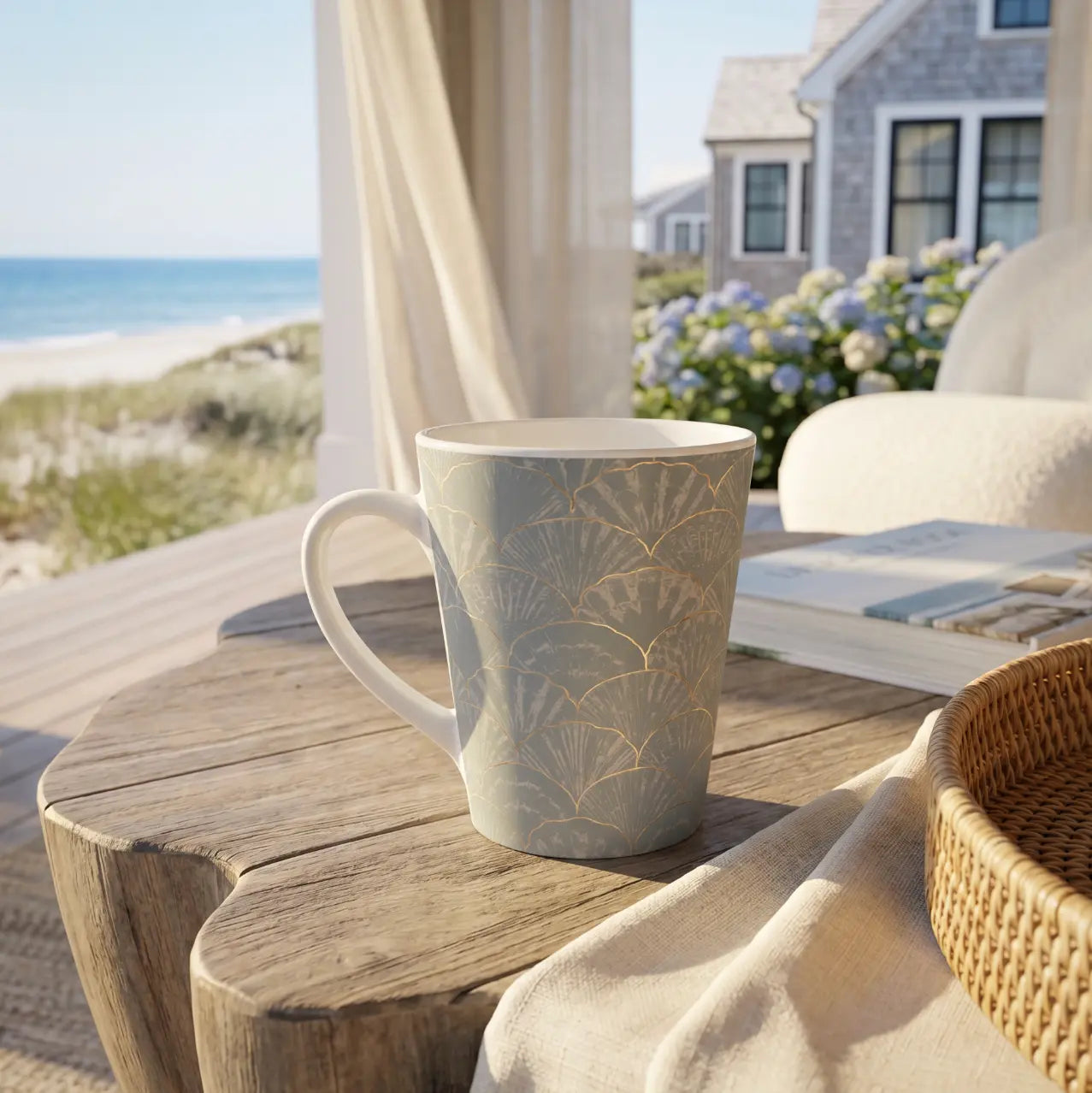 Light blue seashell coffee mug with coastal shell pattern