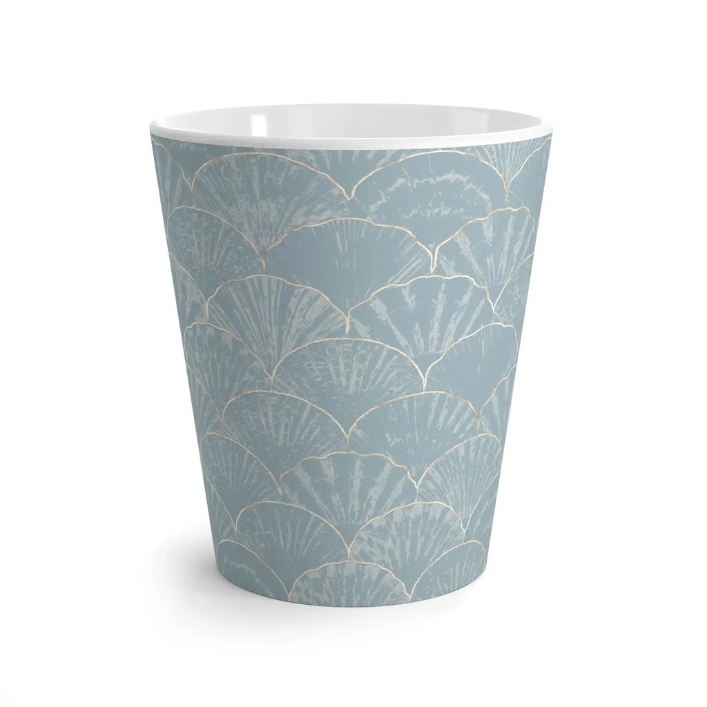 Side view of light blue seashell coffee mug showing handle and shell design