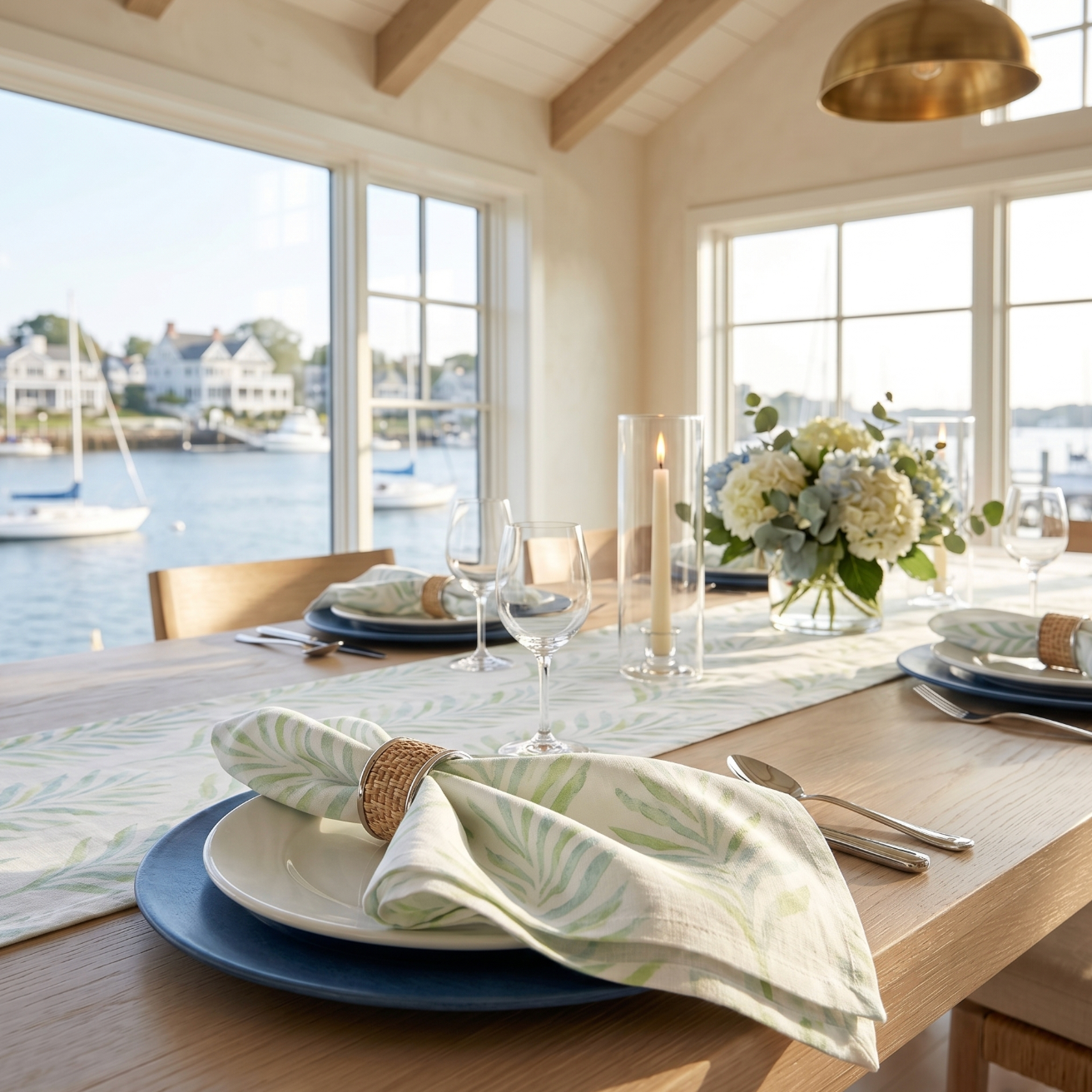 Coastal leaf motif napkins set of 4 that pair beautifully with rattan placemats and clear glassware.