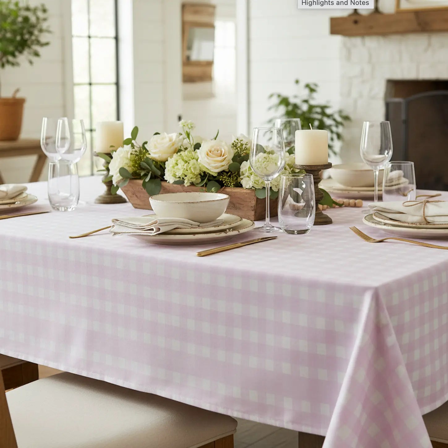 Pink and white gingham tablecloth creating a soft, playful look on a coastal dining table