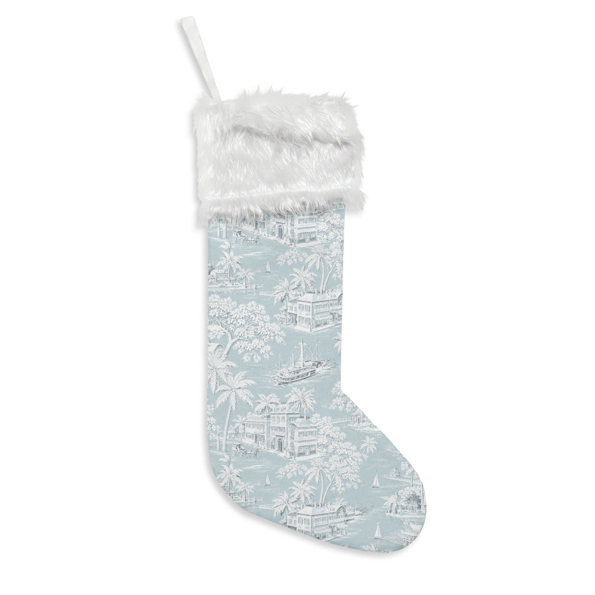 Elegant coastal Christmas stocking featuring a pale blue scenic toile print and soft white cuff