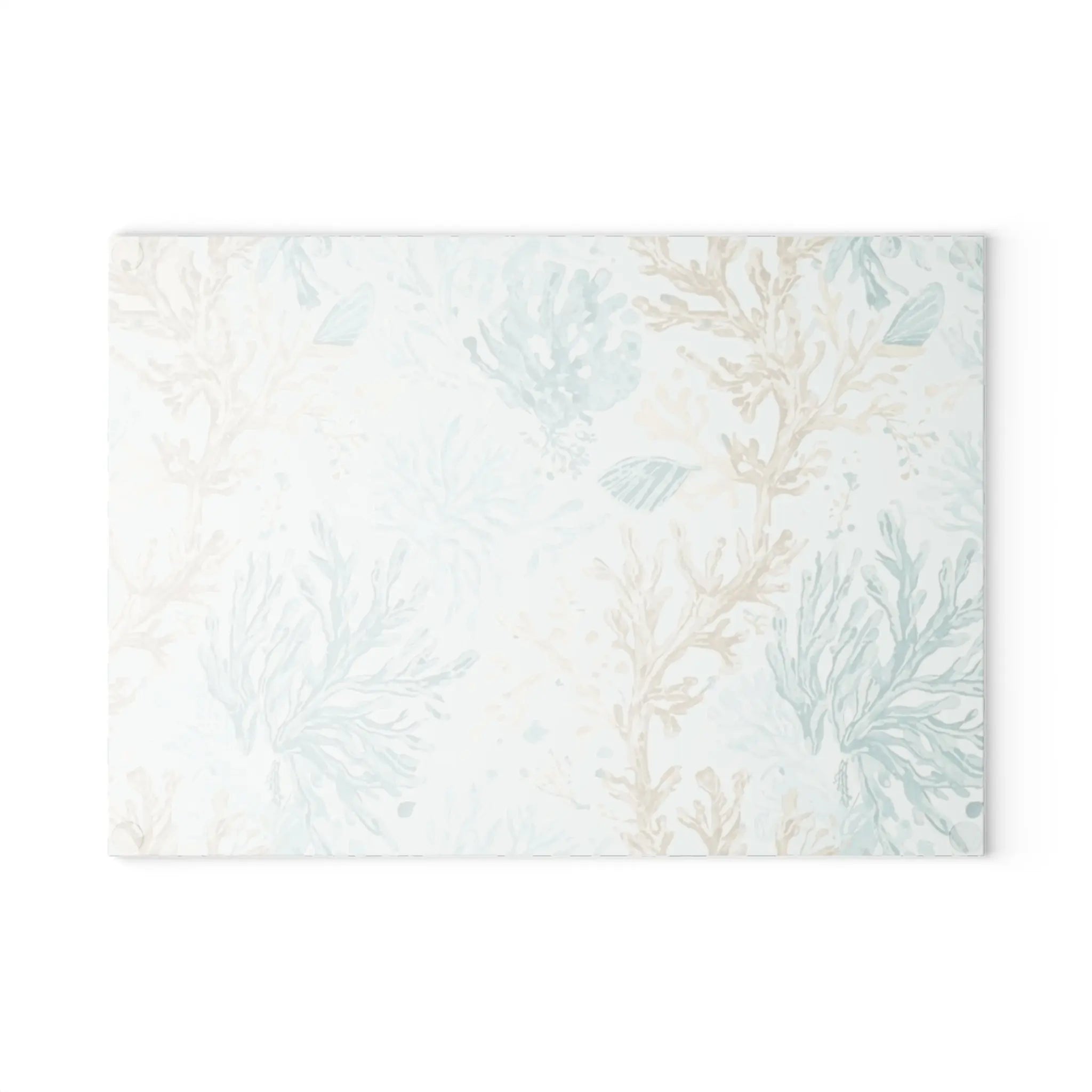 Coral Cove Glass Cutting Board with aqua floral pattern on tempered glass for coastal kitchen decor.