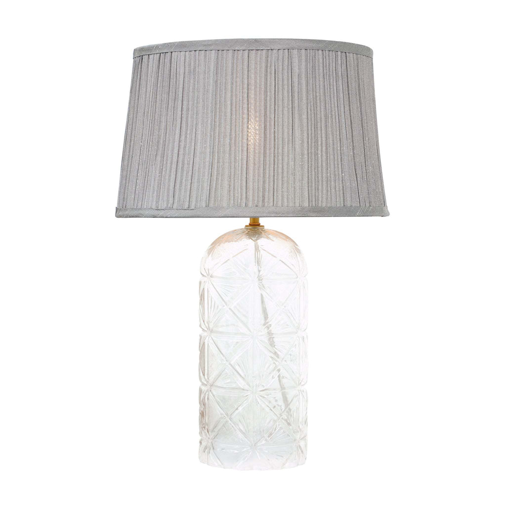 Luxury glass table lamp that adds a soft, diffused glow to a bedroom, office desk, or living room.