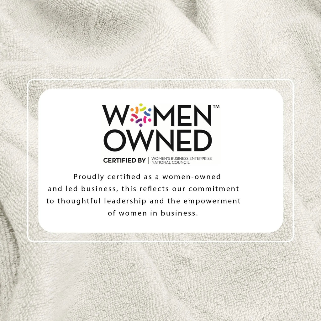 Bath towel set badge by Great Bay Home on beige towel background, featuring Women Owned certification.