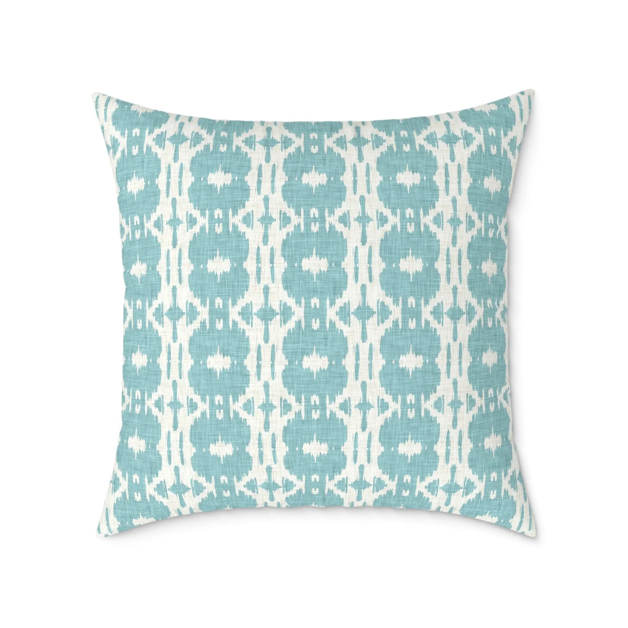 Bali Coast Ikat Pillow in teal and pale aqua with a blurred ikat pattern on a square coastal throw pillow.