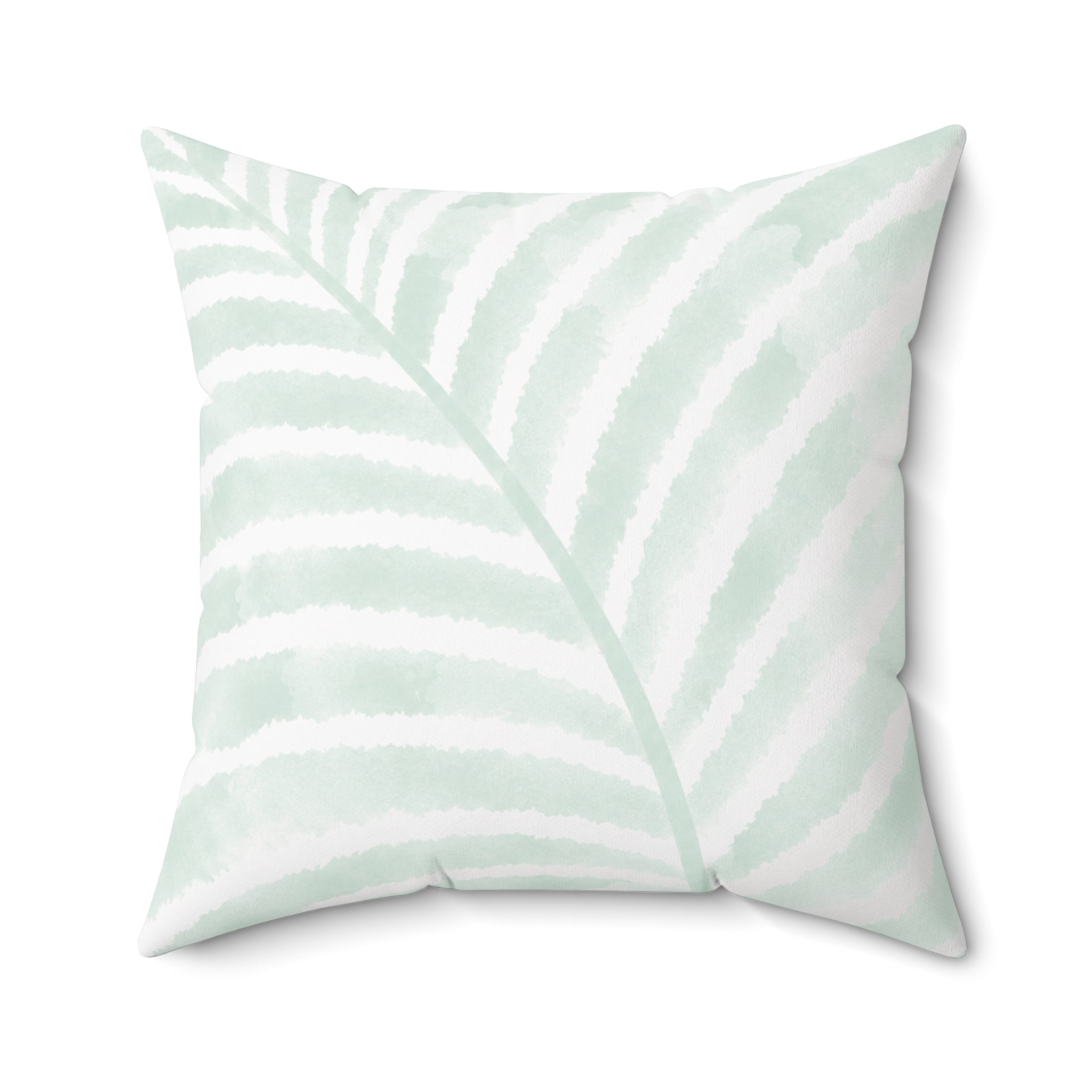 Beach-inspired throw pillow with a soft tropical botanical design.