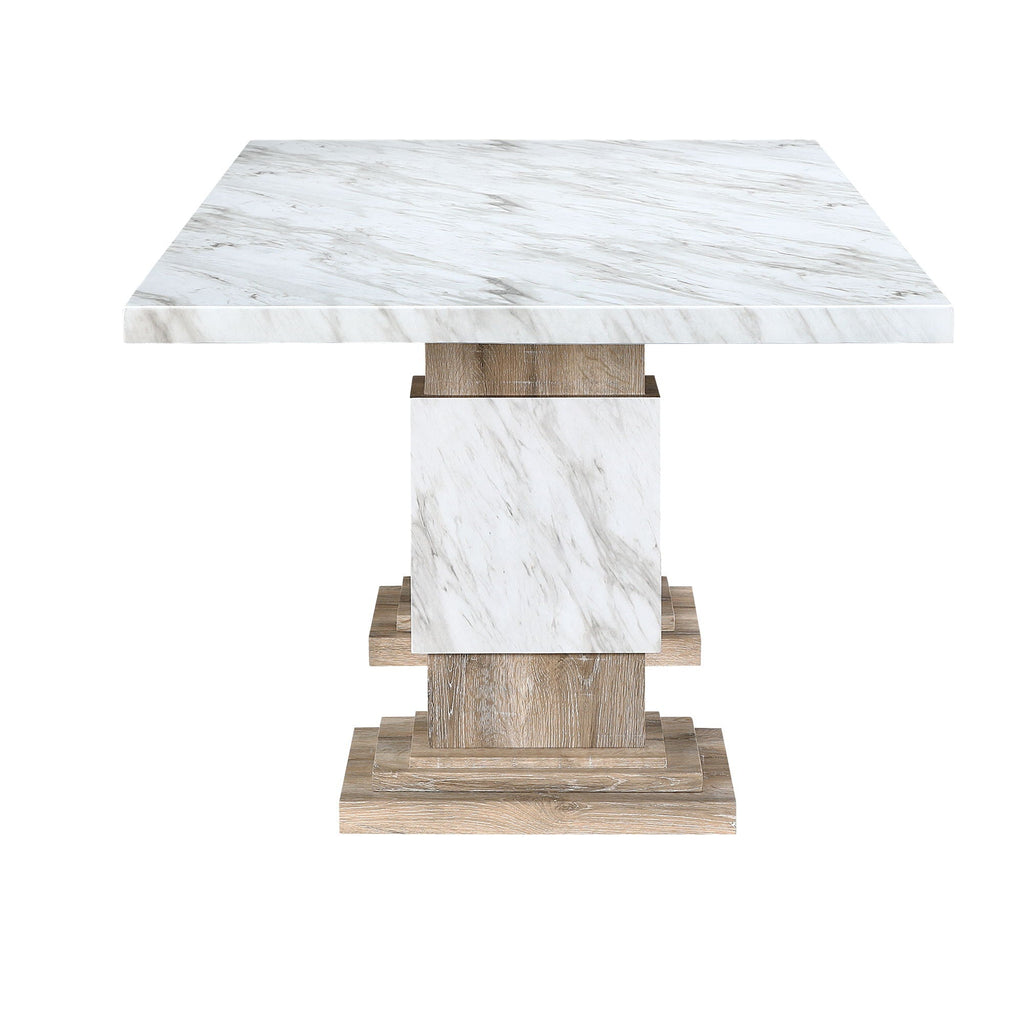 Natural wood and white marble dining table with double pedestals for a bright coastal dining room