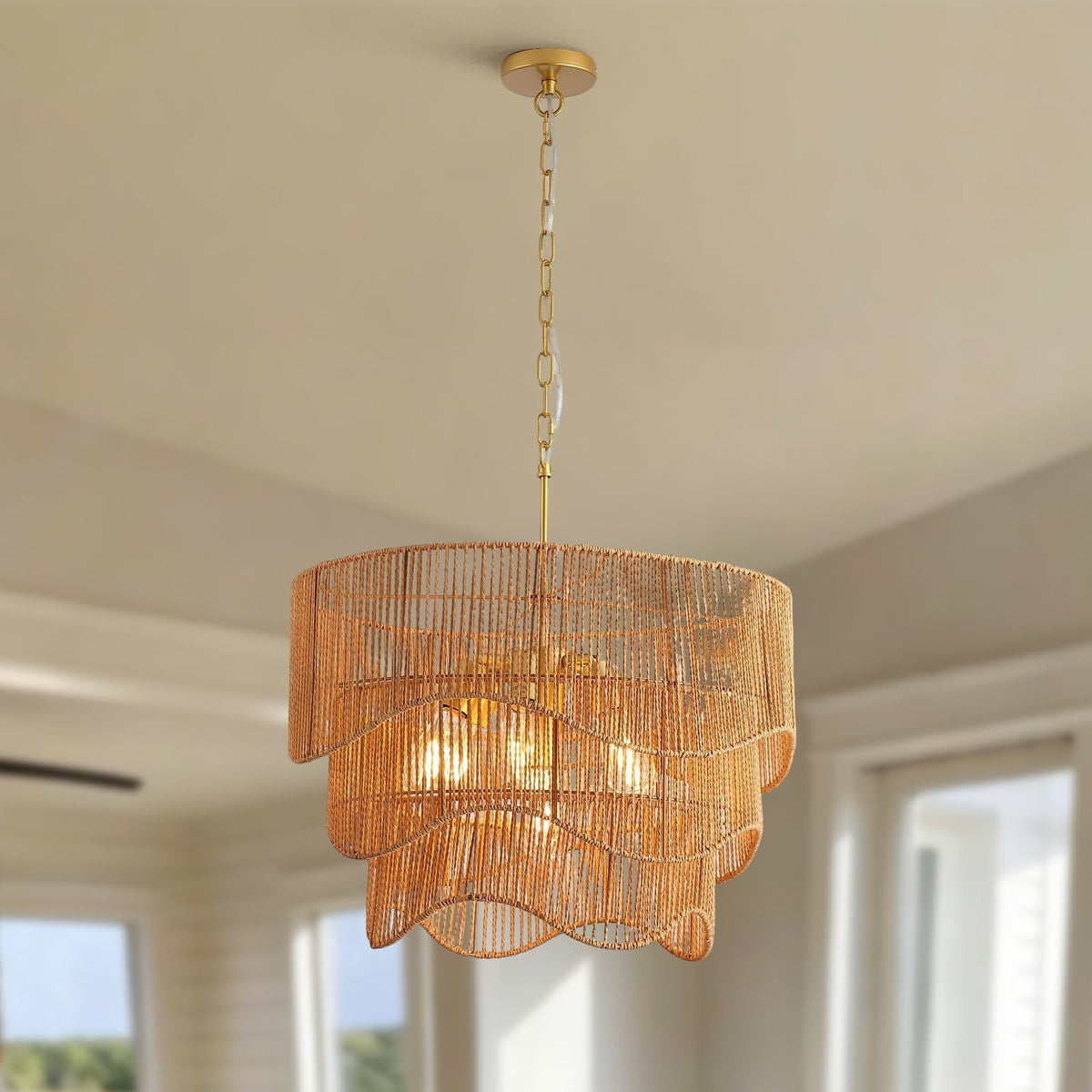 Natural woven chandelier for modern coastal interiors with soft scalloped edges