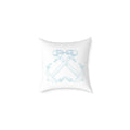 Anchorline Pillow with light blue crossed anchors and rope bows on white background.