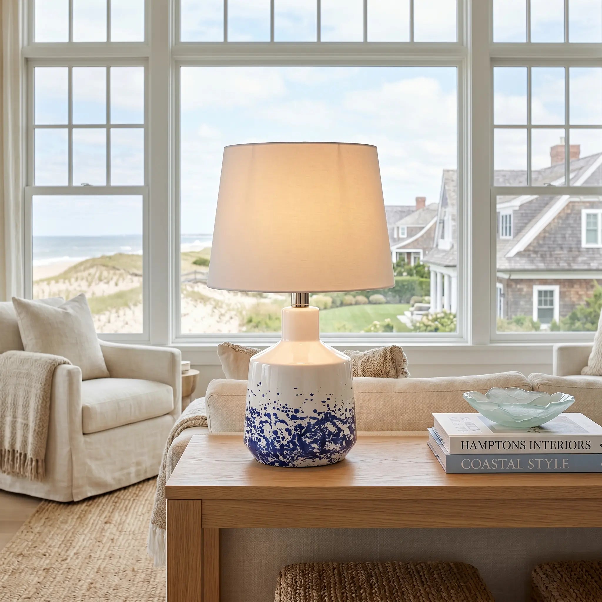Sculptural coastal table lamp featuring expressive blue splash artistry