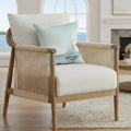 Sailboat Throw Pillow with a blue sailboat motif, adds calm coastal charm to a living room.