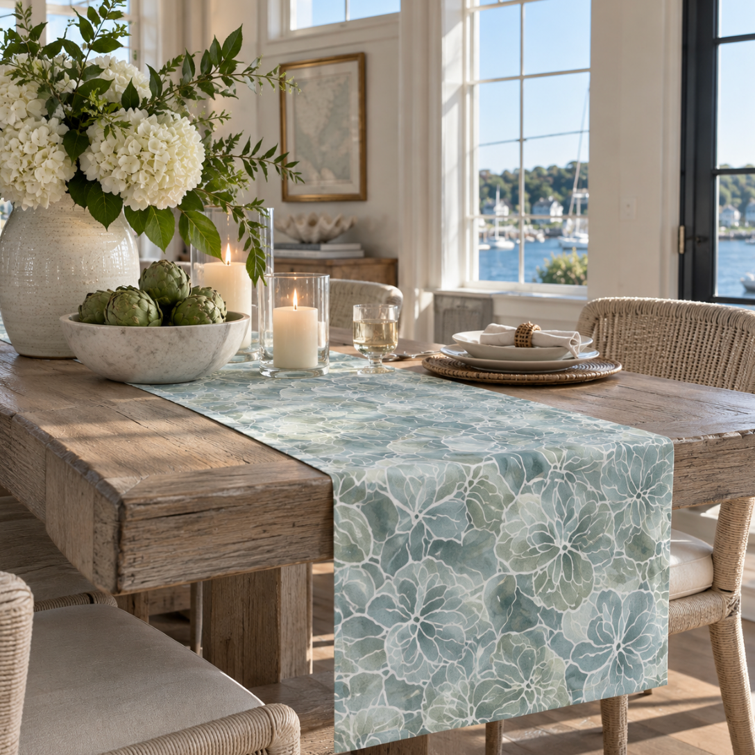 Coastal hydrangea table runner creating an elegant nautical-inspired dining room tablescape
