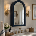 Navy blue arched wall mirror with a deep rounded frame and clean modern silhouette