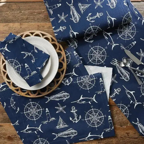 Captain's Quarters Table Runner in navy nautical print with compasses, anchors, ships, and sea motifs.
