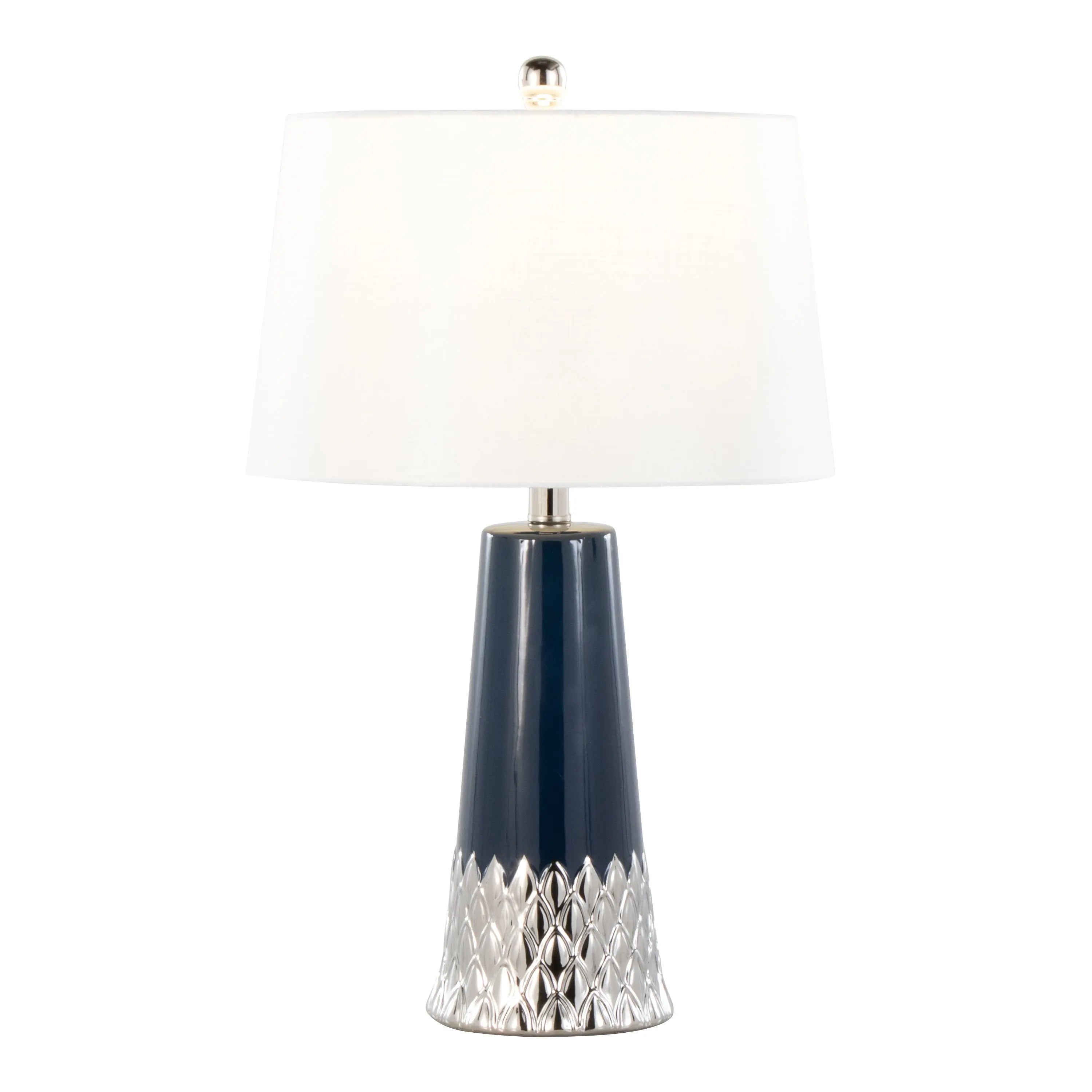 Navy lamp with white shade adding a bold accent to a neutral living room.
