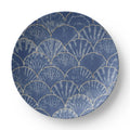Navy seashell ceramic dinner plate with ocean-inspired design
