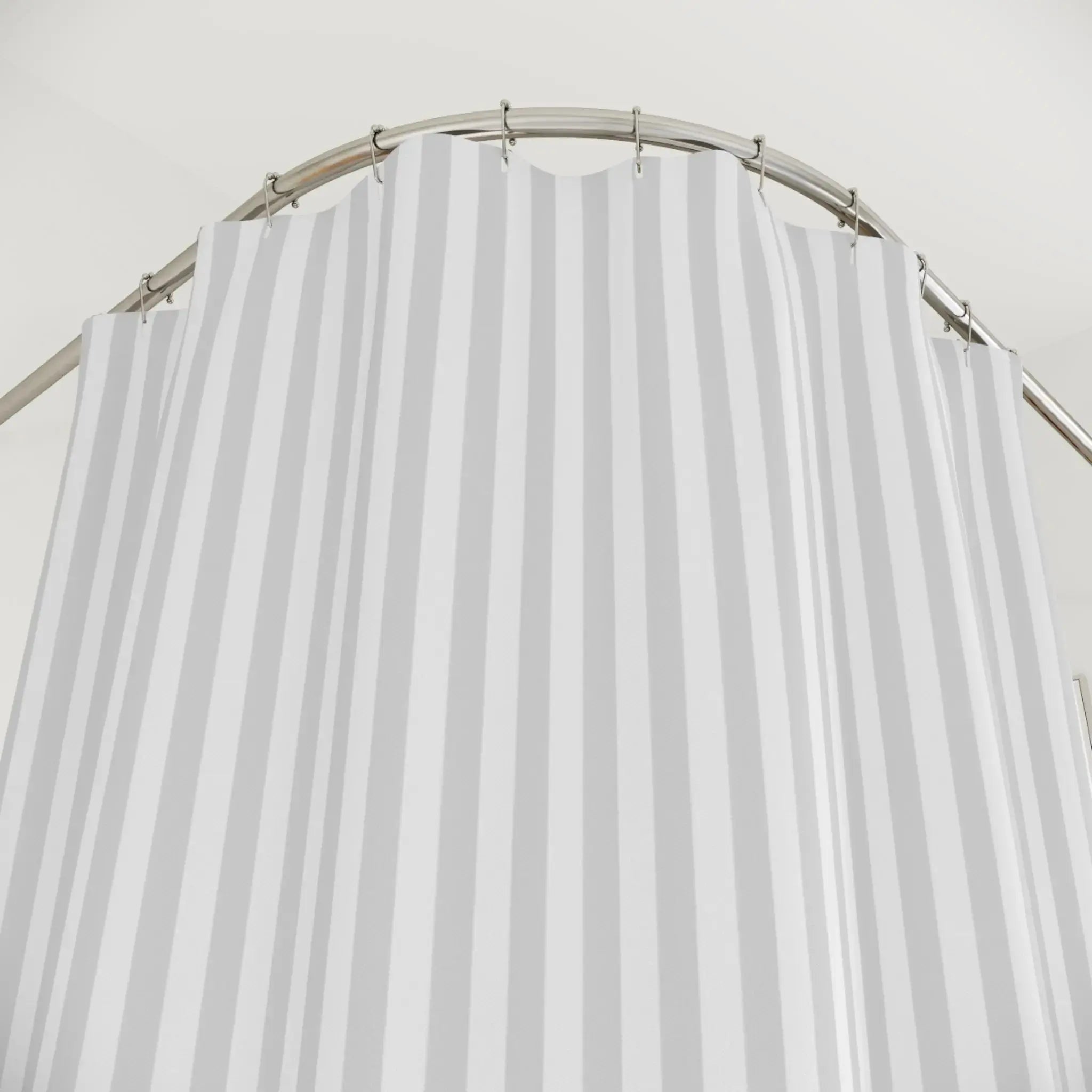 Neutral striped shower curtain in gray and white tones