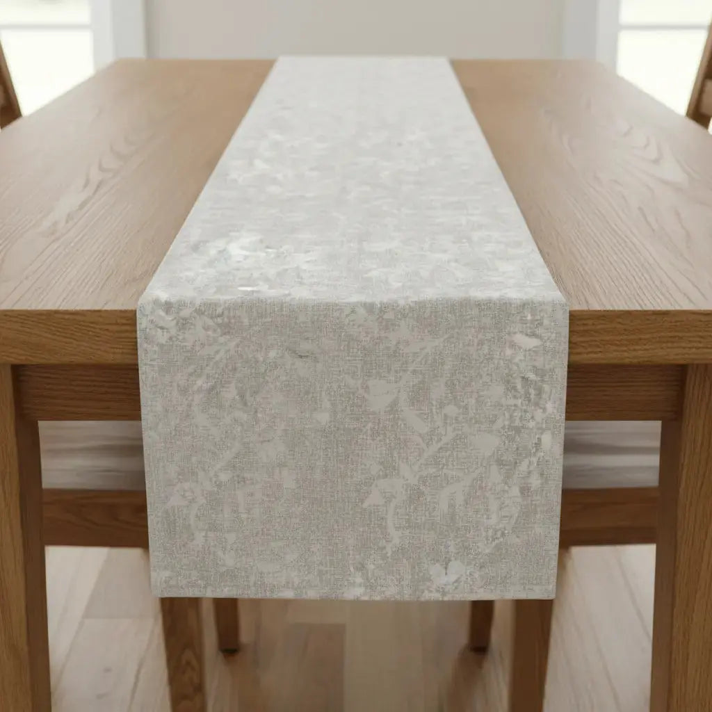 Soft neutral floral table runner for a minimalist coastal tablescape