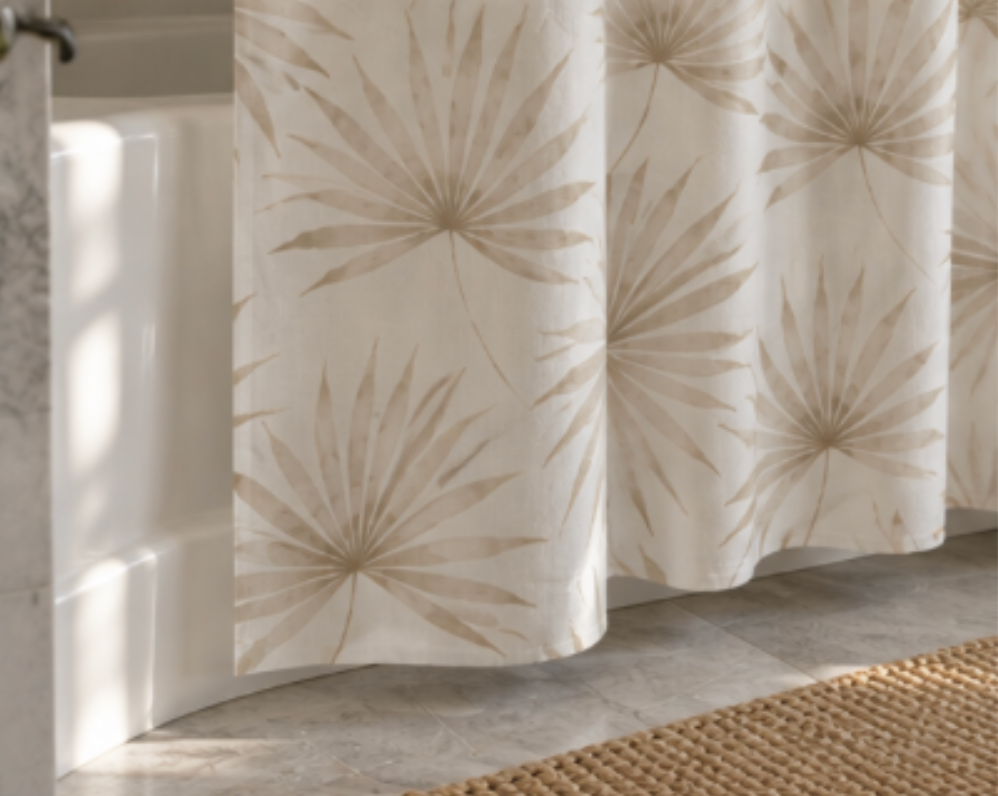 Neutral palm shower curtain styled in a sophisticated beach house bathroom