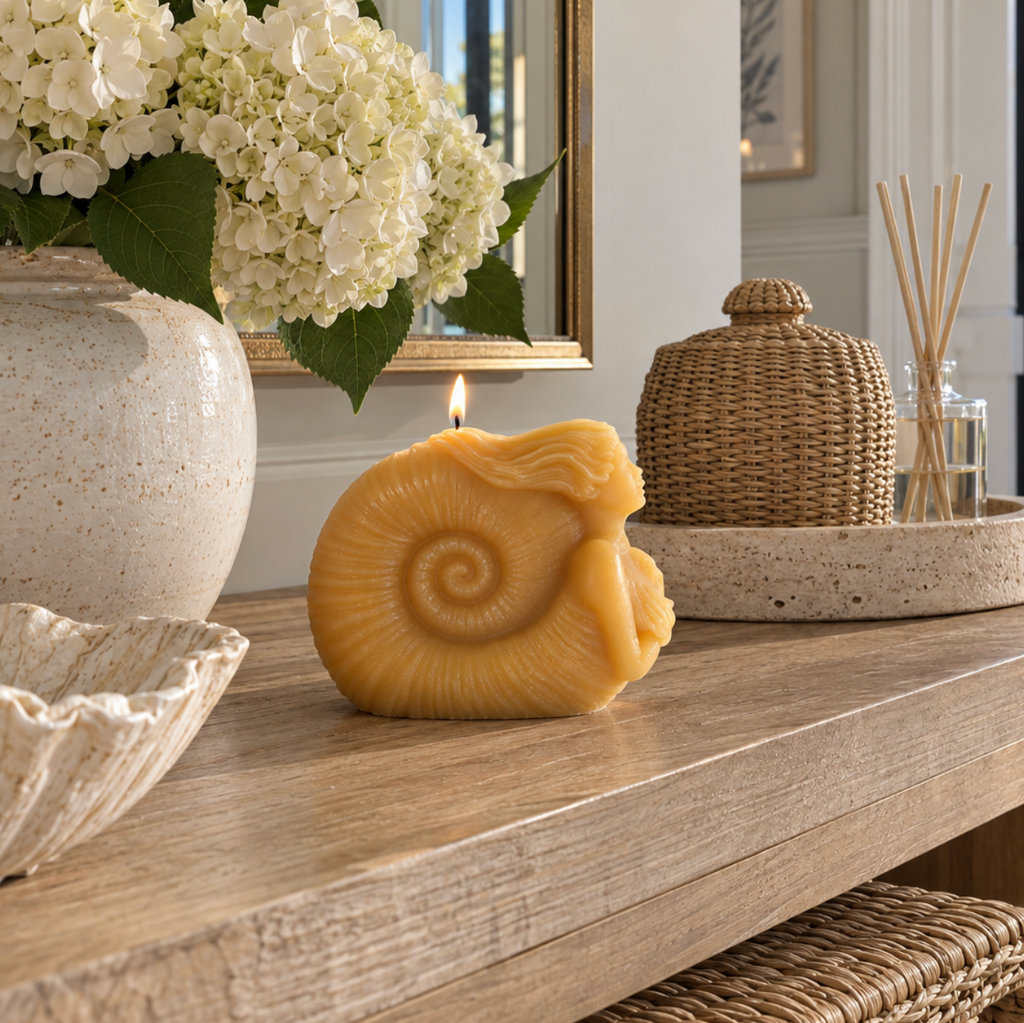 Ocean-inspired mermaid candle for beach house and coastal decorating.