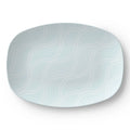 Light blue coastal design serving platter, 10x14-inch oval with white wavy lines.