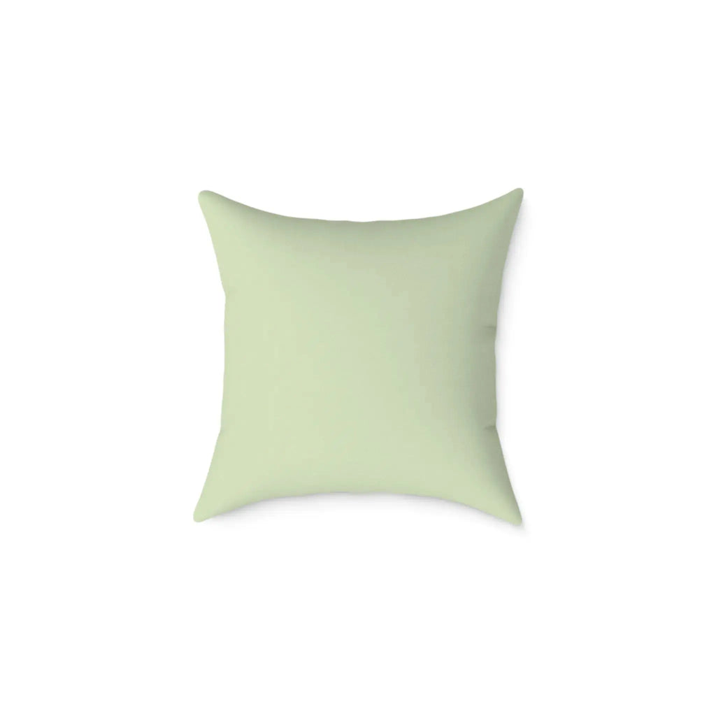 Decorative tropical cushion with vibrant leafy print on both sides.