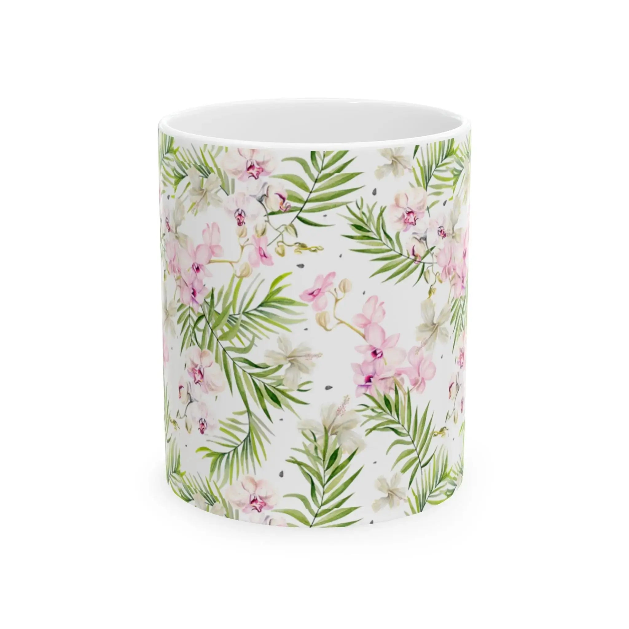 Side view of pink and green tropical coffee mug with curved handle.