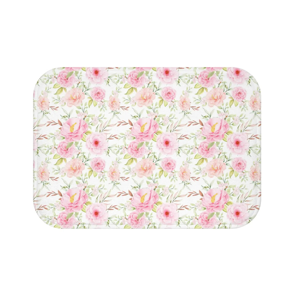 Closeup of pink floral pattern on soft bath mat