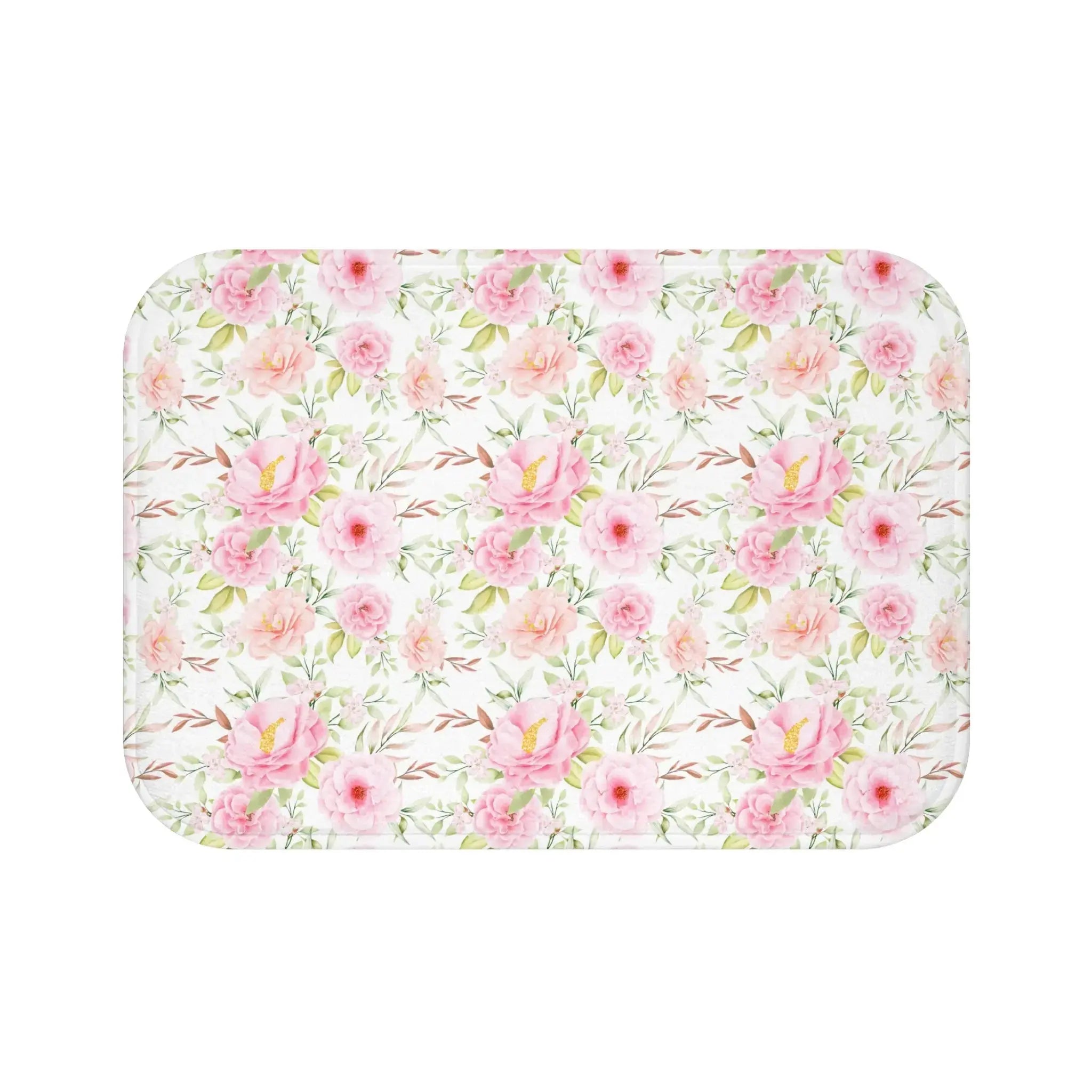 Closeup of pink floral pattern on soft bath mat