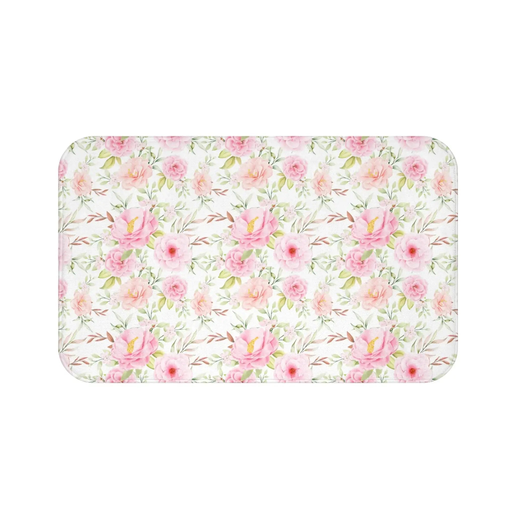 Closeup of pink floral pattern on soft bath mat