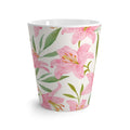 Closeup of pink flower pattern on ceramic coffee mug.