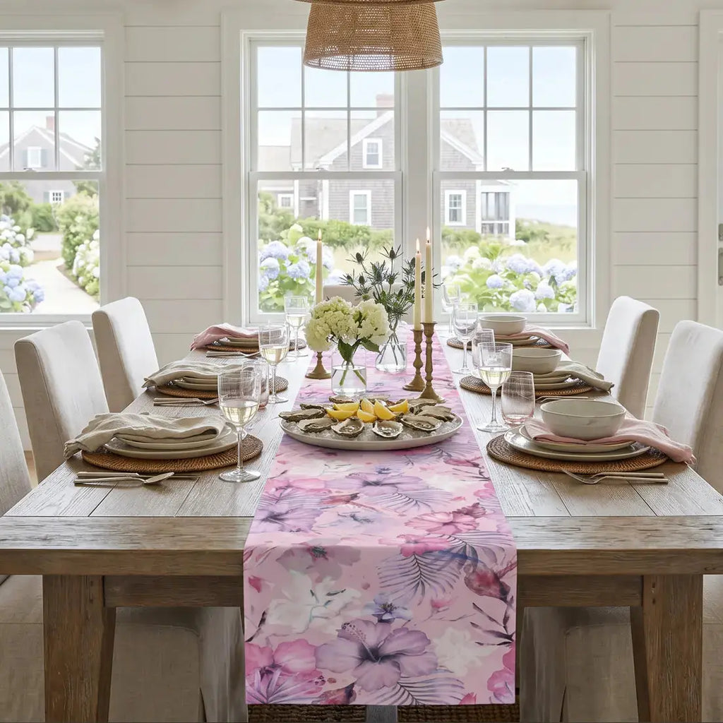 Pink tropical floral table runner styled for summer entertaining in a beach house