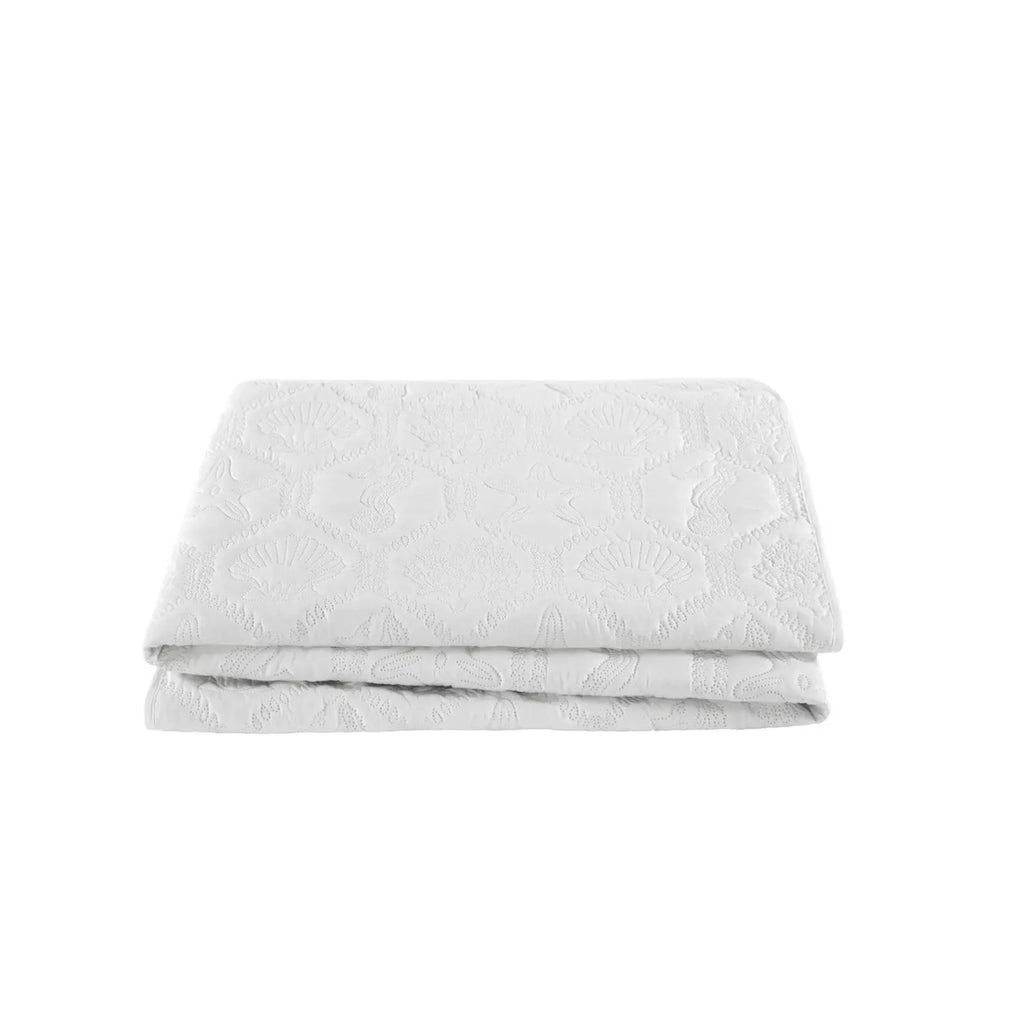 Queen white coastal beach quilt and shams creating a fresh beachy look in the bedroom