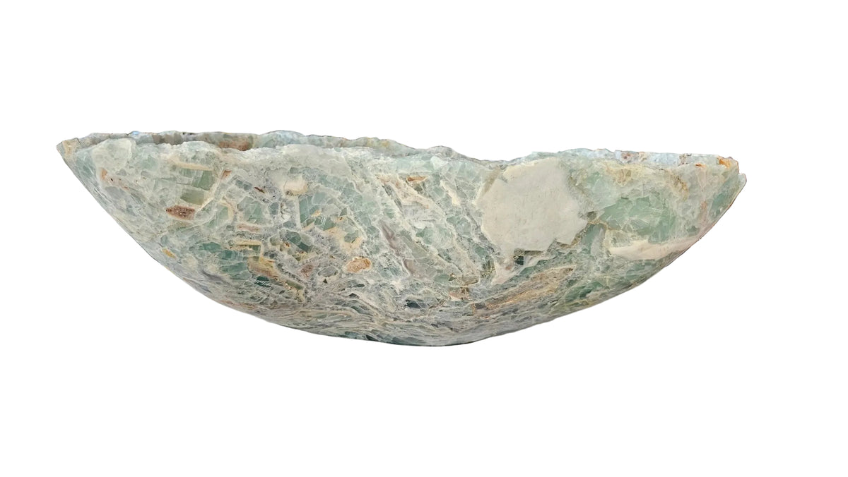 Unique carved fluorite centerpiece with layered crystalline patterns and an asymmetrical sculptural rim.
