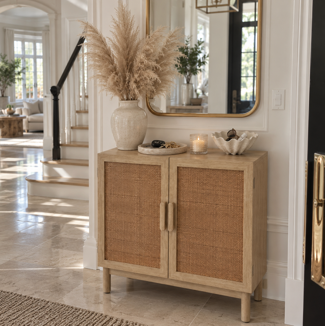Natural wood storage cabinet with woven rattan doors for a coastal entryway or living room