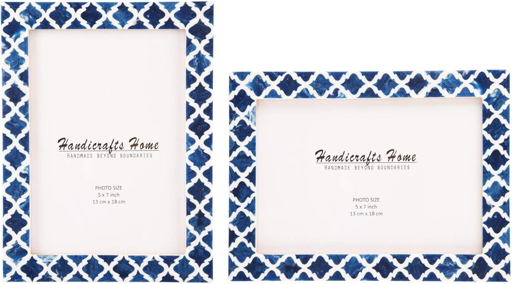 Pair of royal blue and ivory Moroccan resin inlay photo frames adding a refined coastal accent on a white oak consol