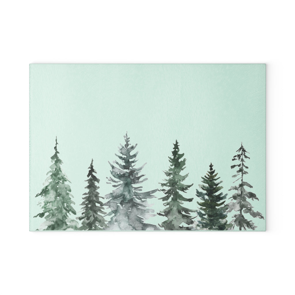 Sage green Christmas cutting board with a minimalist winter tree design.