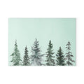 Sage green Christmas cutting board with a minimalist winter tree design.