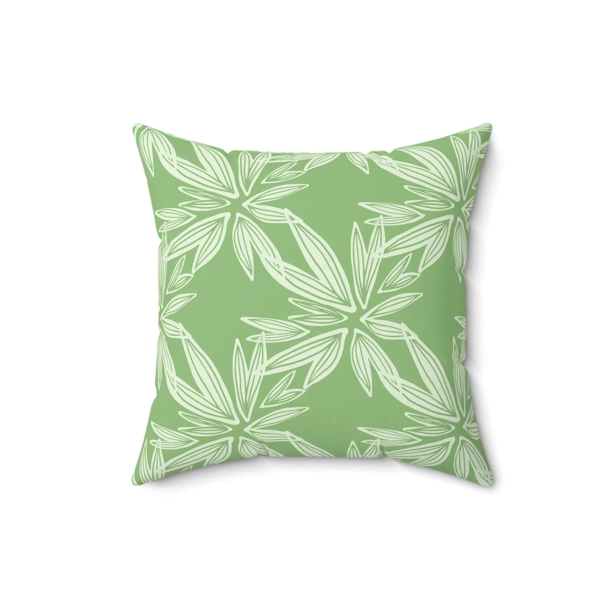 Sage green throw pillow with a leaf pattern for coastal decor